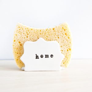 Soporte para estropajo de cerámica blanco y negro